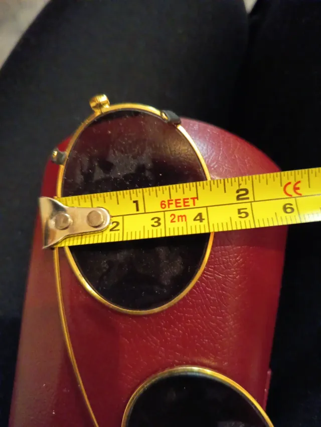 Gafas sol clip-on ovaladas doradas