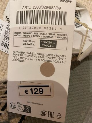 Alfombra Zara Home algodón gris y blanco