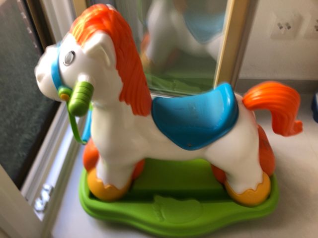 Caballito balancín infantil