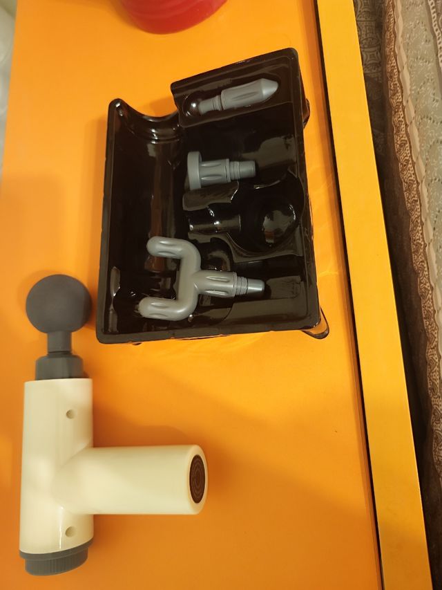 Pistola masaje muscular