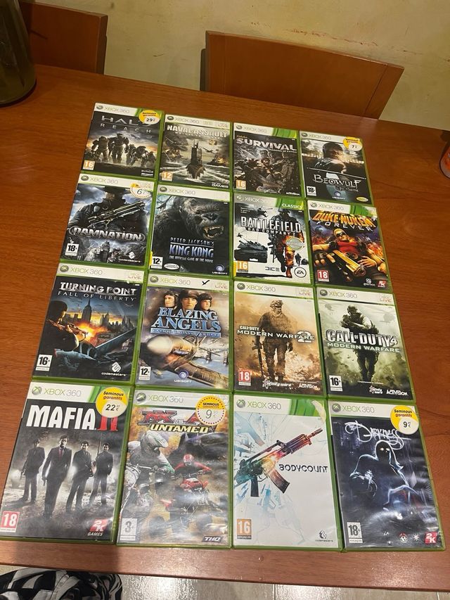 Lote de 40  juegos Xbox 360 más pistola