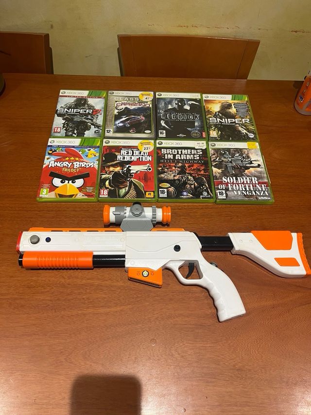 Lote de 40  juegos Xbox 360 más pistola