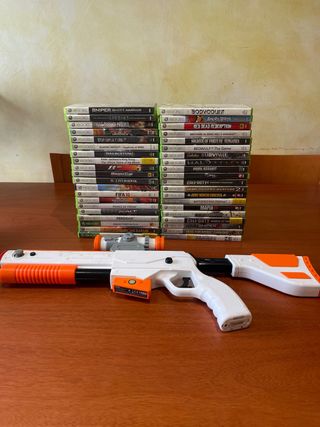 Lote de 40  juegos Xbox 360 más pistola