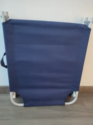 Tumbona azul plegable