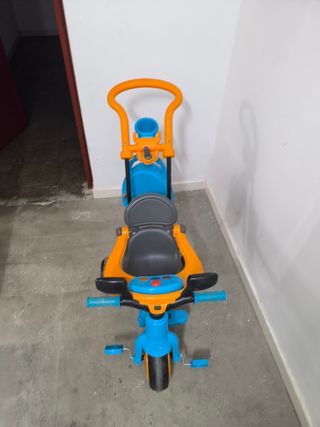 Triciclo infantil baby plus azul y naranja Feber