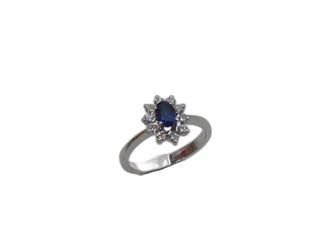 anillo oro 18k con piedra con diamante,zafiro