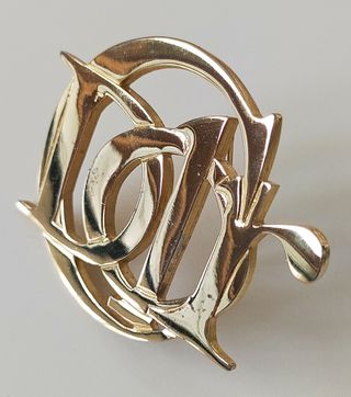 Broche Monograma Dior vintage 90s dorado