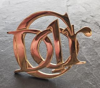 Broche Monograma Dior vintage 90s dorado