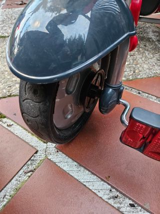 Triciclo infantil con capota