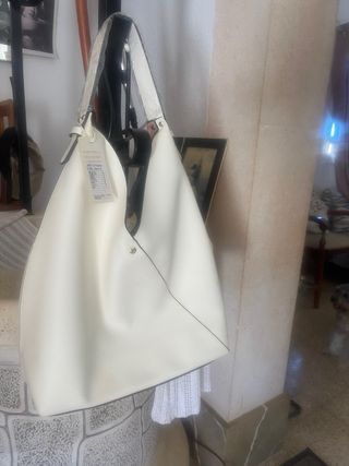 Bolso bandolera rosa y blanco