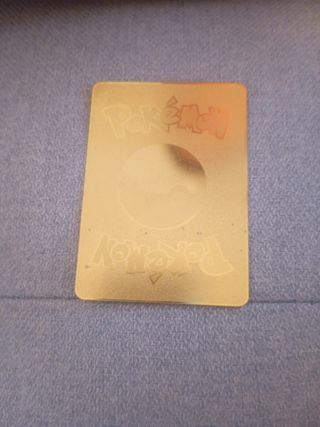 Carta Pokémon Charizard VMAX dorada