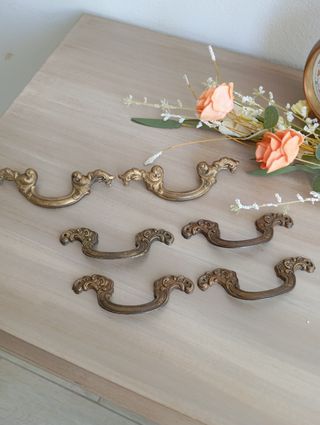 Tiradores antiguos de metal