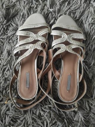 Sandalias romanas doradas Uterque