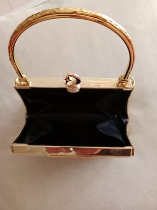Bolso fiesta dorado.