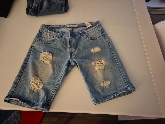 Shorts jeans blu strappati taglia 48