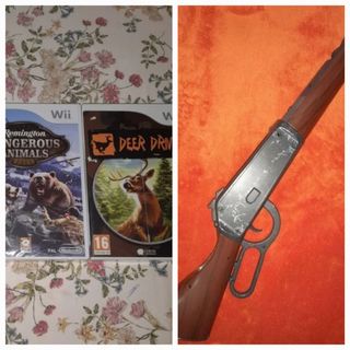 PRECINTADOS. 2 Juegos Wii de cazar+ Rifle Nuevo 