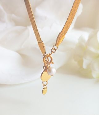 Collar Plano- Acero inoxidable ORO