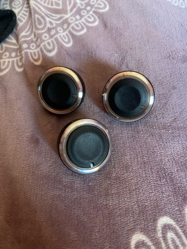 Perillas aire acondicionado Ford.