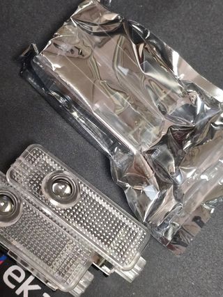 Luces de proyector logo 4 puertas