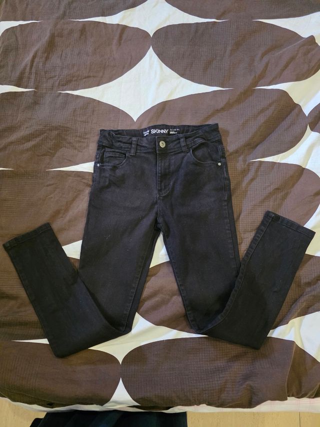 Calças Skinny pretas - Tam. 10/11