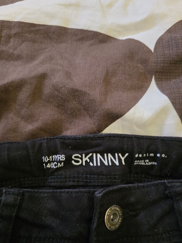 Calças Skinny pretas - Tam. 10/11