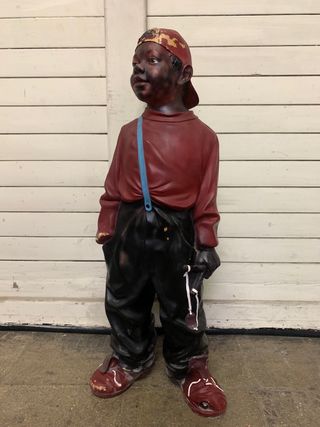 Figura vintage niño.