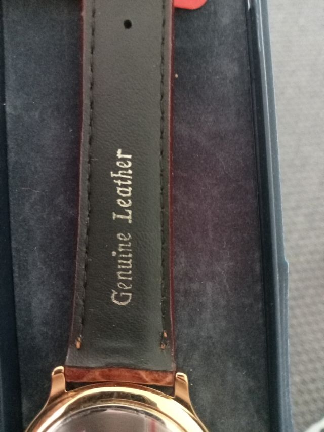 Reloj duward dorado y marron