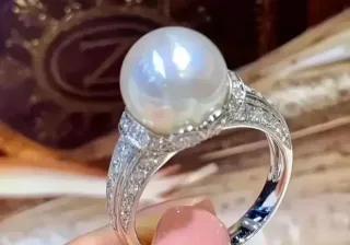 Anillo plata perla y circonitas.