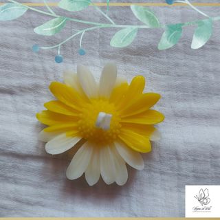 Candela a forma di margherita