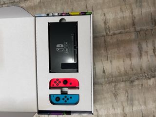 Nintendo Switch roja y azul + funda
