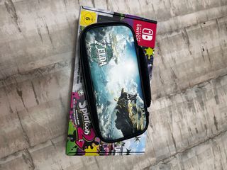 Nintendo Switch roja y azul + funda