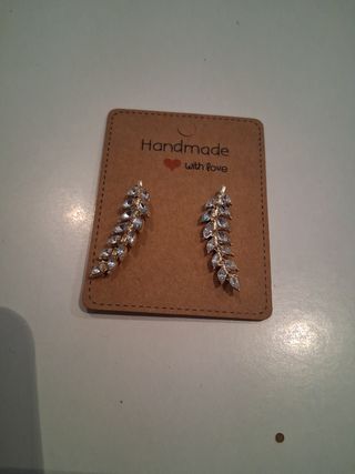 Pendientes hoja brillantes dorados