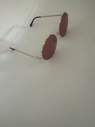 Gafas sol redondas y funda