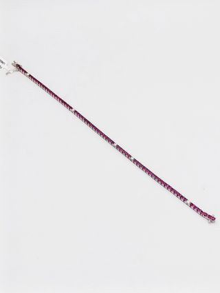 Pulsera Rivière en oro blanco de 18k- rubíes y bri