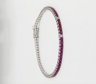Pulsera Rivière en oro blanco de 18k- rubíes y bri