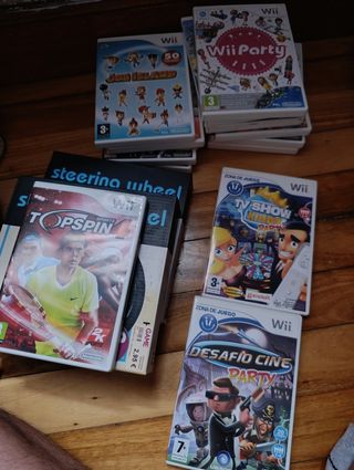 Wii +Videojuegos + 2 Volantes y tres mandos