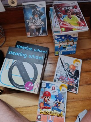 Wii +Videojuegos + 2 Volantes y tres mandos
