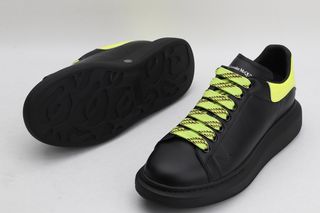 Sneakers Alexander McQueen nere giallo fluo
38-44