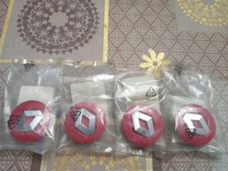 Tapabujes  llantas renault orig rs