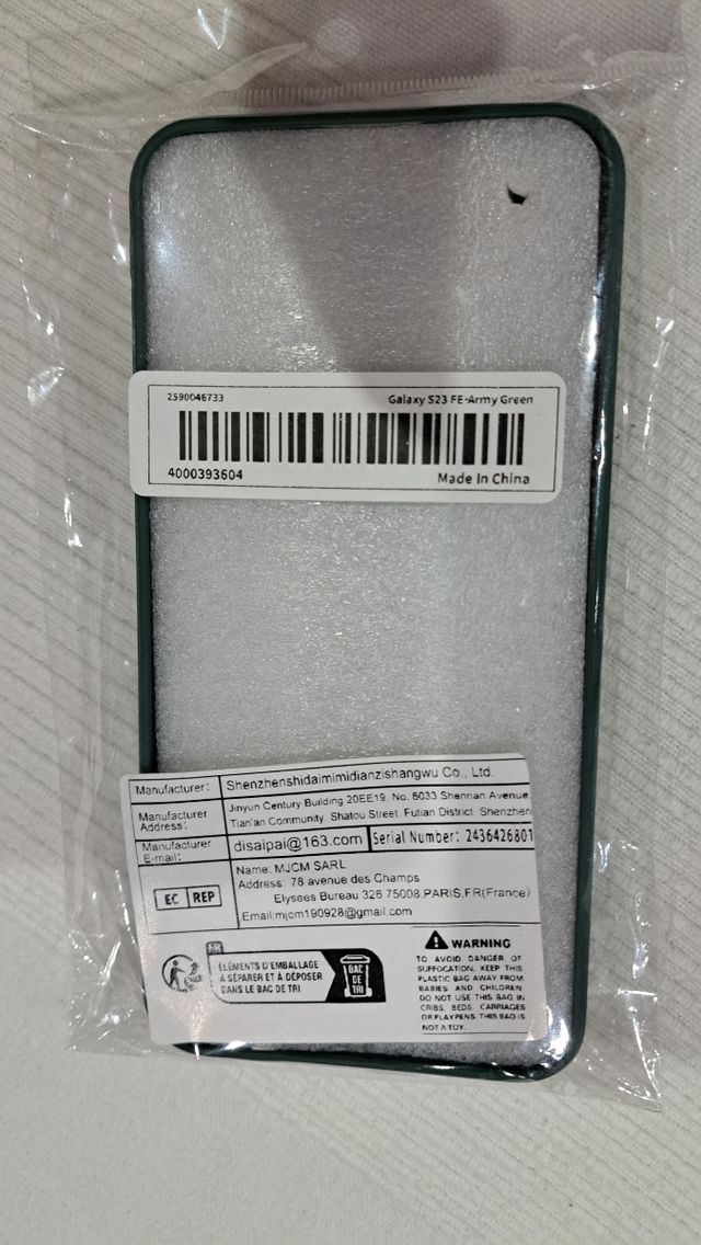 Funda móvil verde con anillo