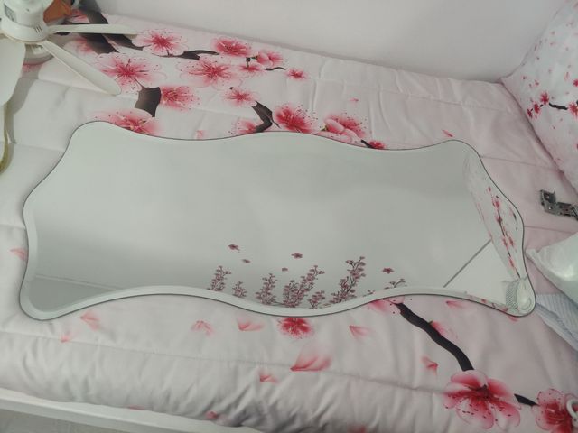 Espejo curvo plateado