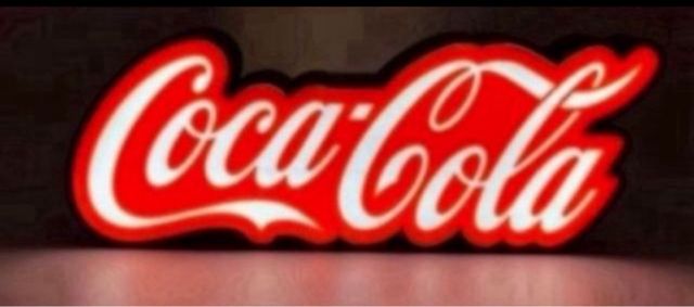 Cartaz luminoso da Coca Cola