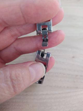 Pulsera negra y plateada hombre.