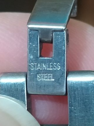 Pulsera negra y plateada hombre.