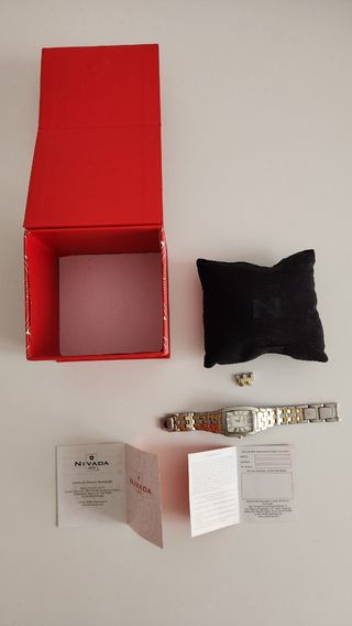 Reloj Nivada acero inoxidable.
