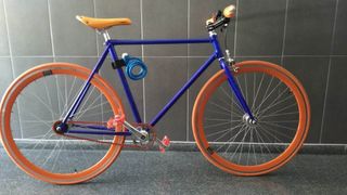 Bicicleta carretera como nueva azul y naranja