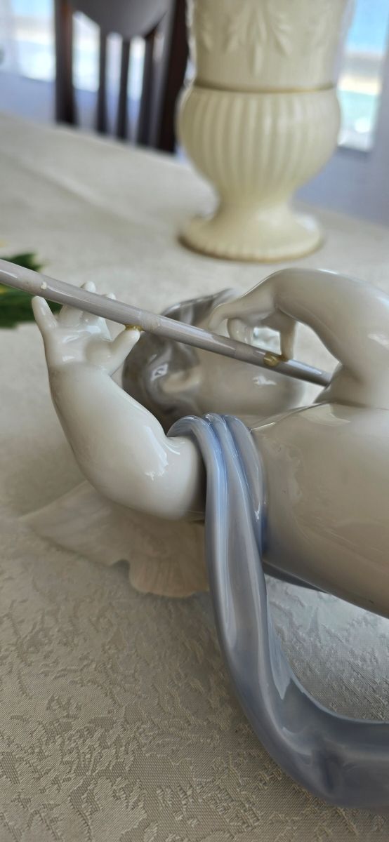 Lladró: Figura ángel flauta porcelana