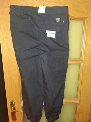 Pantalones nuevos negros, talla M 41