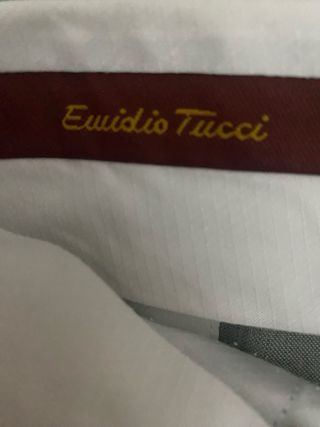 Pantalón de traje con pinzas. 