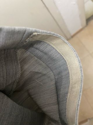 Pantalón de traje con pinzas. 